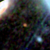 Colour composite: F444W red, F356W green, F277W blue, 3.2 arcsec across, north up