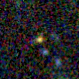 Colour composite: F444W red, F356W green, F277W blue, 3.2 arcsec across, north up